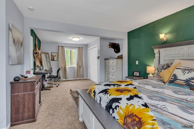 carpeted bedroom with a closet