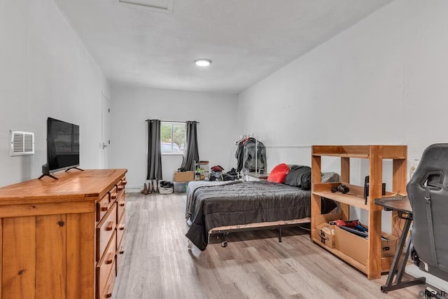 bedroom featuring light hardwood / wood-style floors