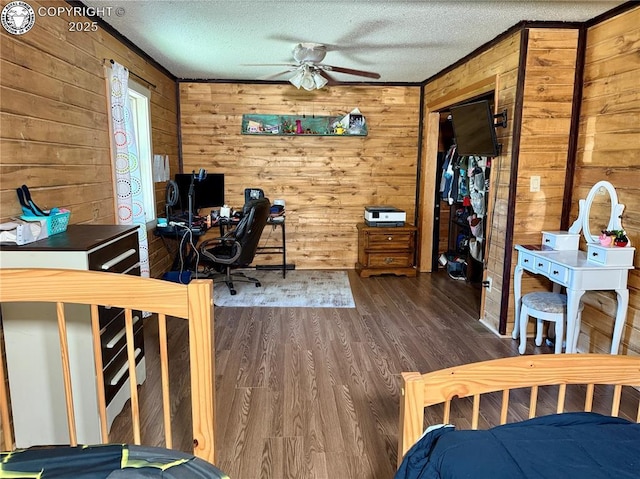 430 Broadway St, Silver Cliff, CO 81252 - office with wooden walls, a textured ceiling, wood finished floors, and ceiling fan