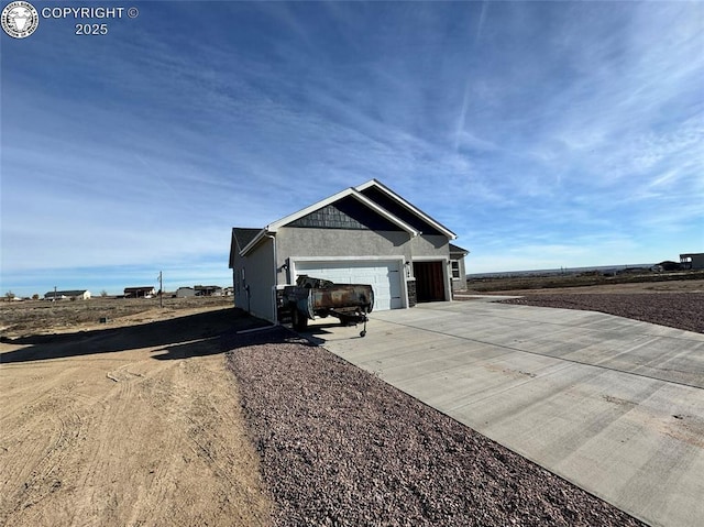 view of property exterior featuring a garage