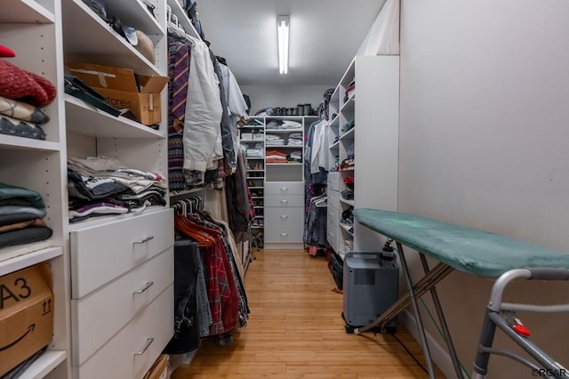 walk in closet featuring light wood-type flooring