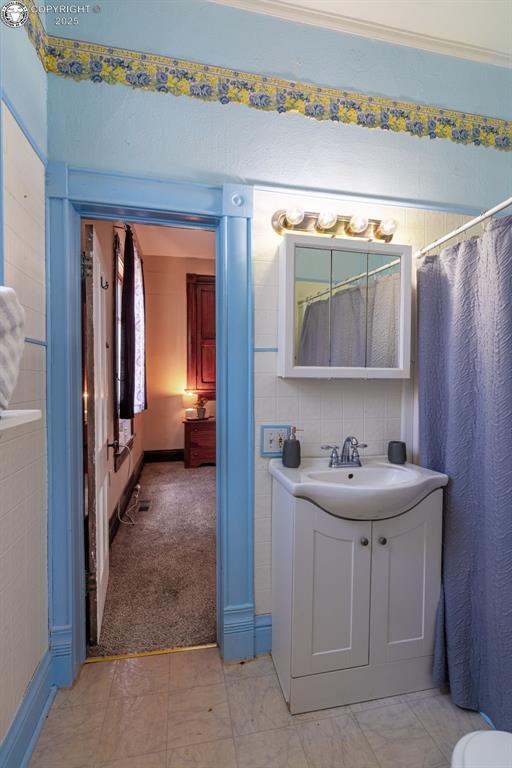 711 Allison Ave, Canon City, CO 81212 - bathroom with marble finish floor and vanity