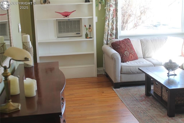 sitting room with wood finished floors