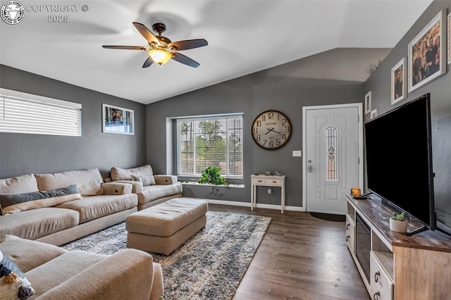 3065 Pear St, Canon City, CO 81212 - living area featuring vaulted ceiling, ceiling fan, dark wood-style floors, and baseboards