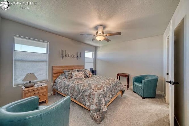 336 Arrowhead Dr, Florence, CO 81226 - bedroom featuring carpet floors, a textured ceiling, baseboards, and a ceiling fan