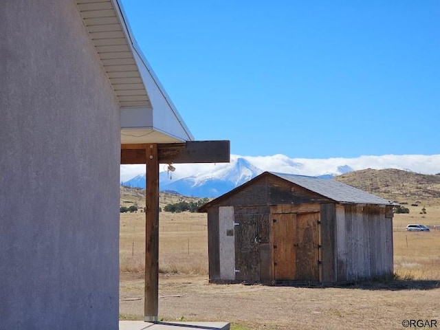 view of outdoor structure with a mountain view