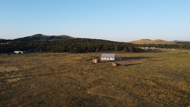 mountain view featuring a rural view