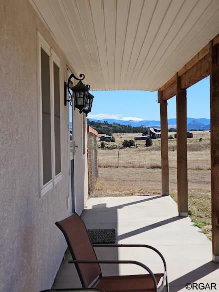 view of patio featuring a mountain view