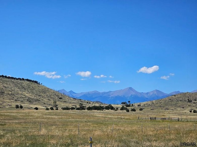 view of mountain feature with a rural view