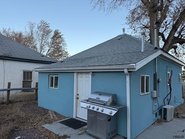 exterior space with central air condition unit