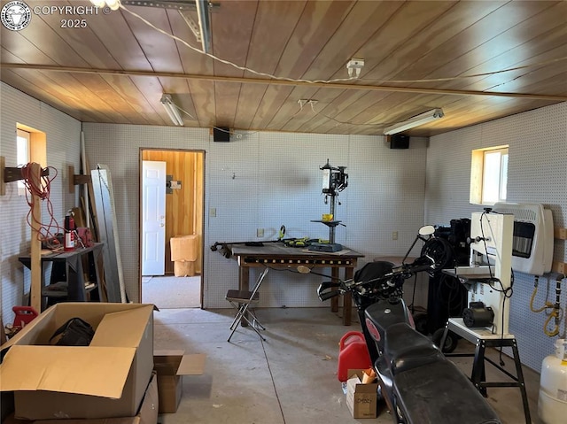 5105 Electric Ave, Westcliffe, CO 81252 - miscellaneous room with concrete flooring, wooden ceiling, and a workshop area