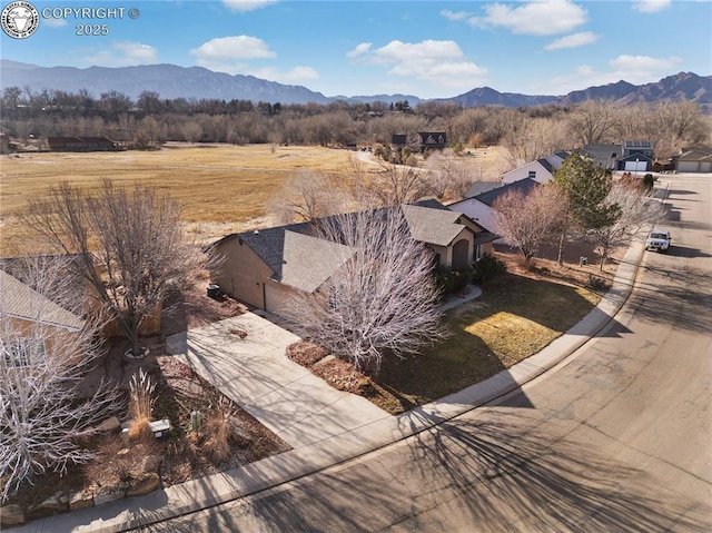 exterior space featuring a mountain view