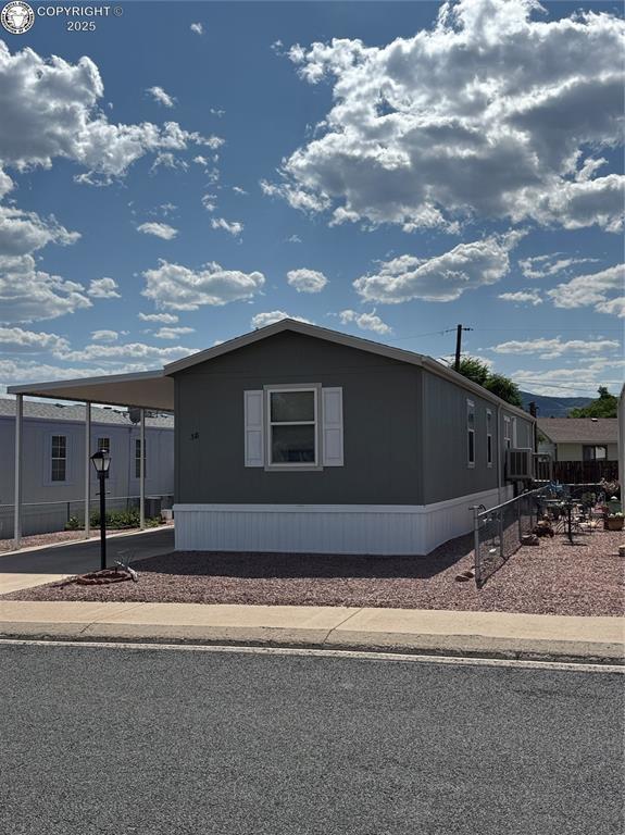 860 Zona St Unit 38, Canon City, CO 81212 - manufactured / mobile home with a carport