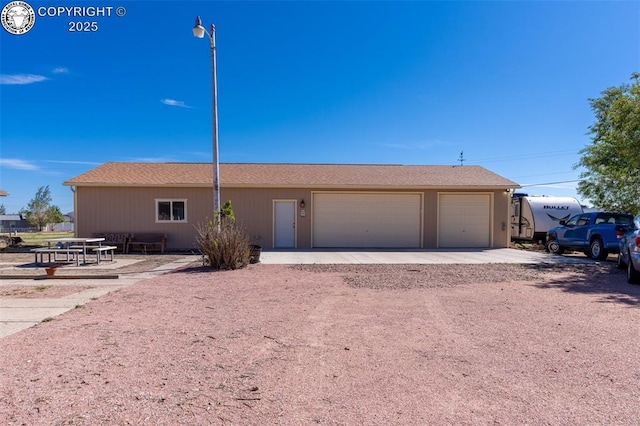 ranch-style home with a garage