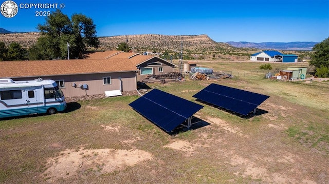 bird's eye view with a mountain view