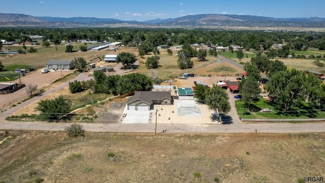 bird's eye view with a mountain view