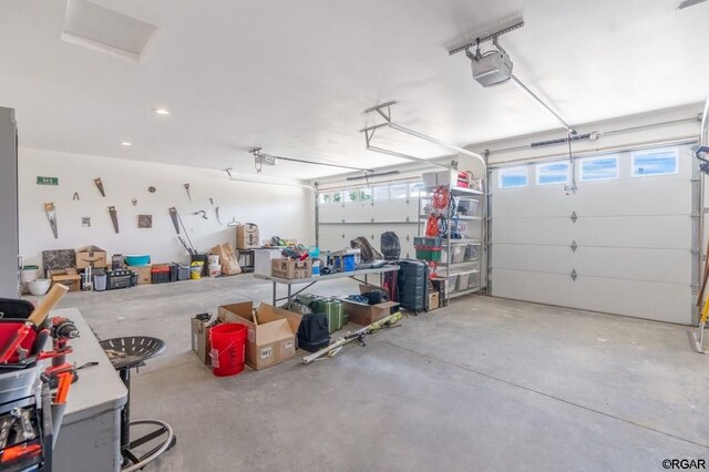 garage featuring a garage door opener