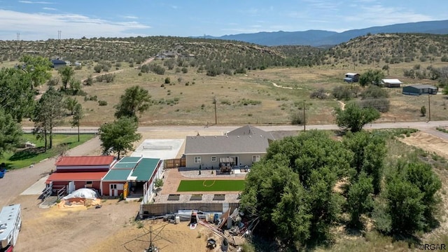 drone / aerial view featuring a mountain view