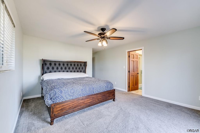 bedroom with ceiling fan and light carpet