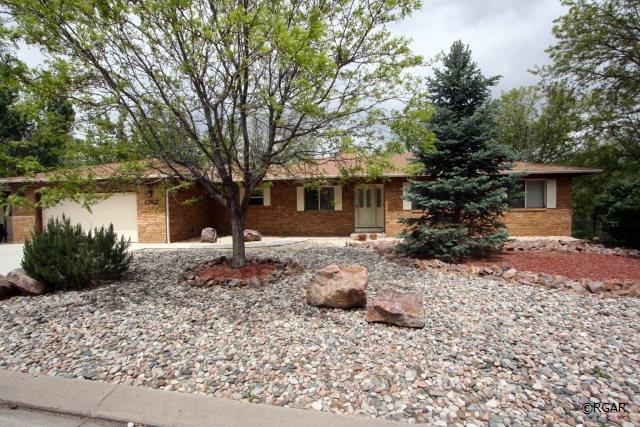 ranch-style house featuring a garage