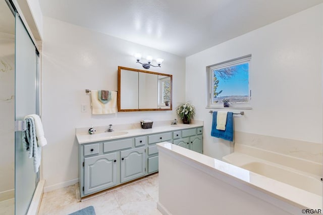 bathroom with tile patterned flooring, vanity, and plus walk in shower