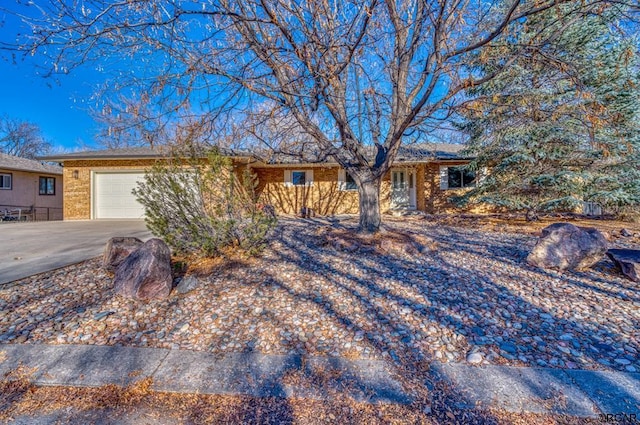 ranch-style home with a garage