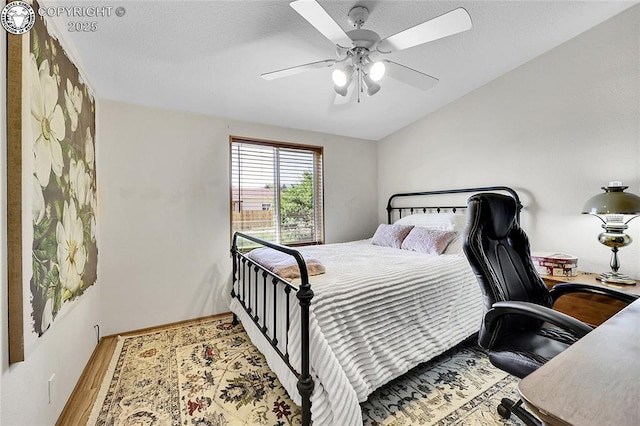 1431 Pine St, Canon City, CO 81212 - bedroom with wood finished floors and a ceiling fan