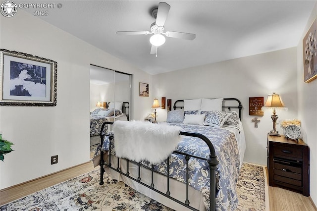 1431 Pine St, Canon City, CO 81212 - bedroom with light wood-style flooring, vaulted ceiling, and a ceiling fan