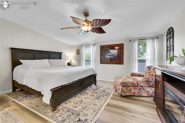 1431 Pine St, Canon City, CO 81212 - bedroom with light wood-style floors, ceiling fan, and vaulted ceiling
