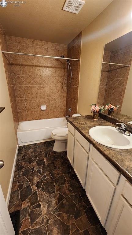 7465 Sun Prairie Dr, Colorado Springs, CO 80925 - bathroom featuring shower / bathtub combination and vanity