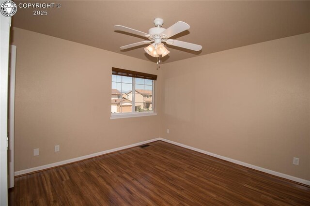 7465 Sun Prairie Dr, Colorado Springs, CO 80925 - empty room featuring dark wood finished floors and a ceiling fan