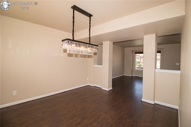 7465 Sun Prairie Dr, Colorado Springs, CO 80925 - unfurnished room featuring dark wood-type flooring and baseboards