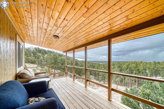421 Bull Domingo Ln, Westcliffe, CO 81252 - wooden deck featuring a forest view
