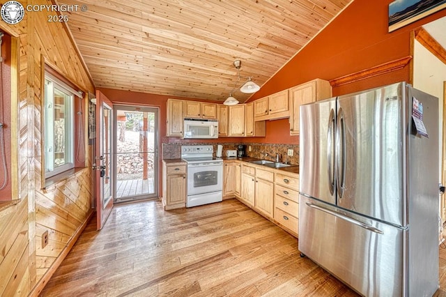 421 Bull Domingo Ln, Westcliffe, CO 81252 - kitchen with white appliances, vaulted ceiling, light brown cabinetry, light wood-style floors, and wooden ceiling