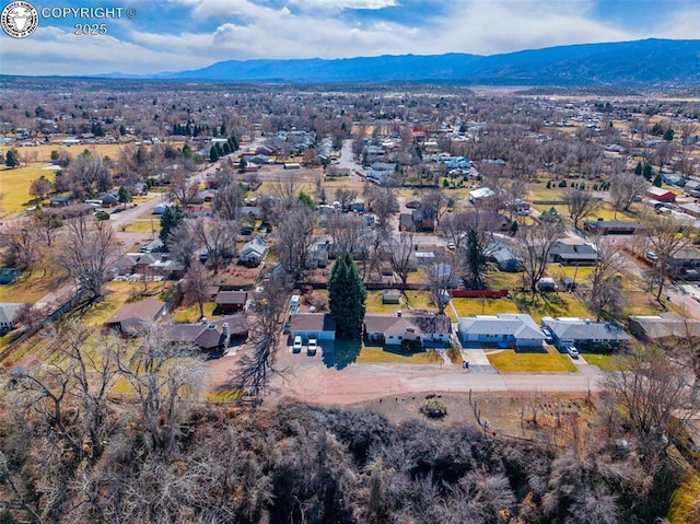 aerial view with a residential view and a mountain view