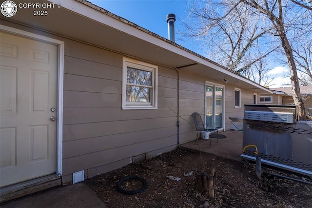 view of property exterior featuring crawl space