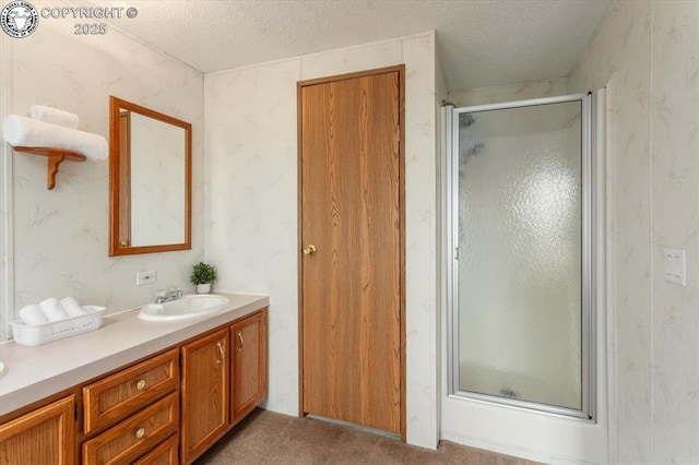 2275 K Path, Cotopaxi, CO 81223 - bathroom with vanity, a shower stall, and a textured ceiling