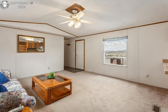 2275 K Path, Cotopaxi, CO 81223 - living room with lofted ceiling, light carpet, ceiling fan, and crown molding
