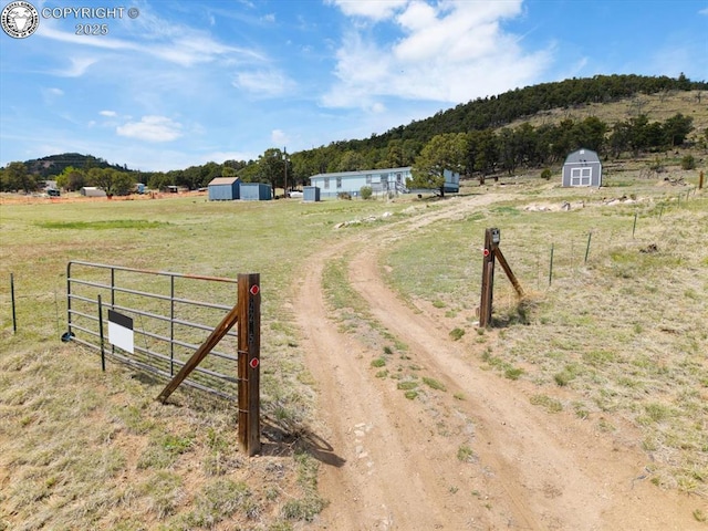 2275 K Path, Cotopaxi, CO 81223 - view of dirt / gravel driveway featuring a view of countryside