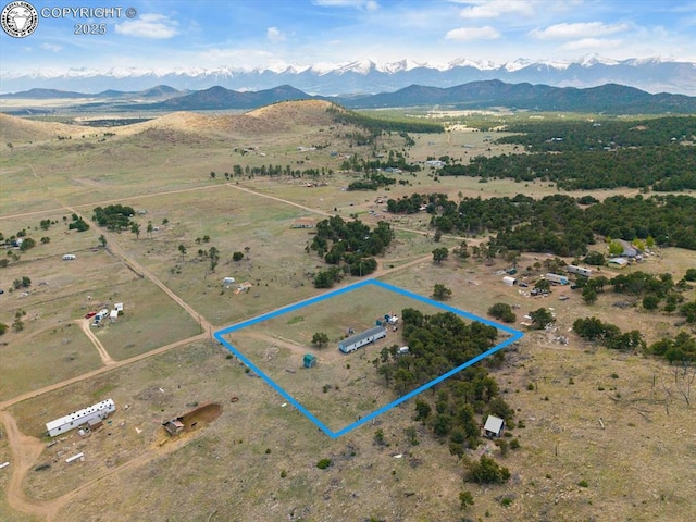 2275 K Path, Cotopaxi, CO 81223 - aerial view of sparsely populated area with a mountain backdrop and property parcel outlined
