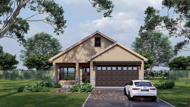 view of front of property featuring a garage, an outdoor structure, and a front lawn