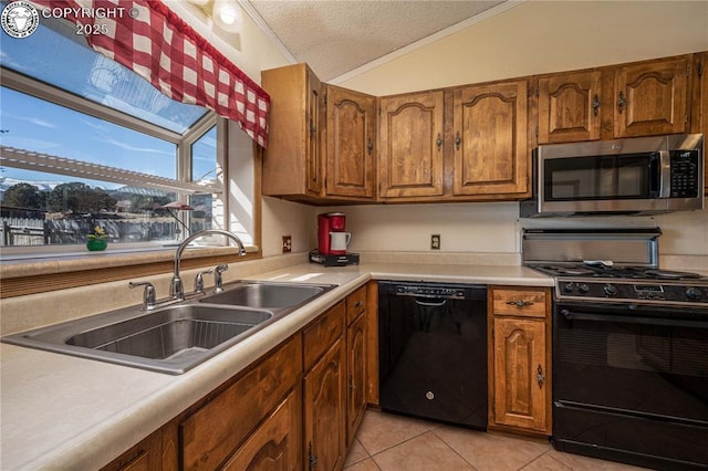 kitchen with lofted ceiling, sink, a textured ceiling, light tile patterned floors, and black appliances