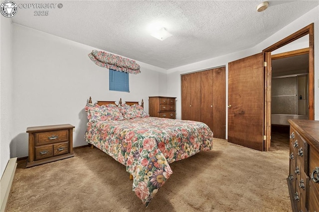 carpeted bedroom featuring a textured ceiling