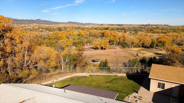 birds eye view of property with a mountain view