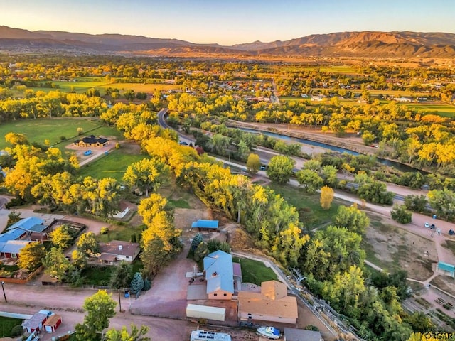 aerial view at dusk with a mountain view