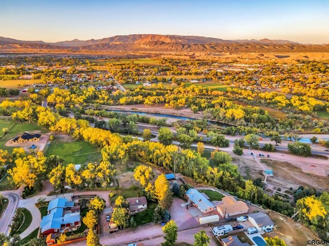 aerial view at dusk with a mountain view