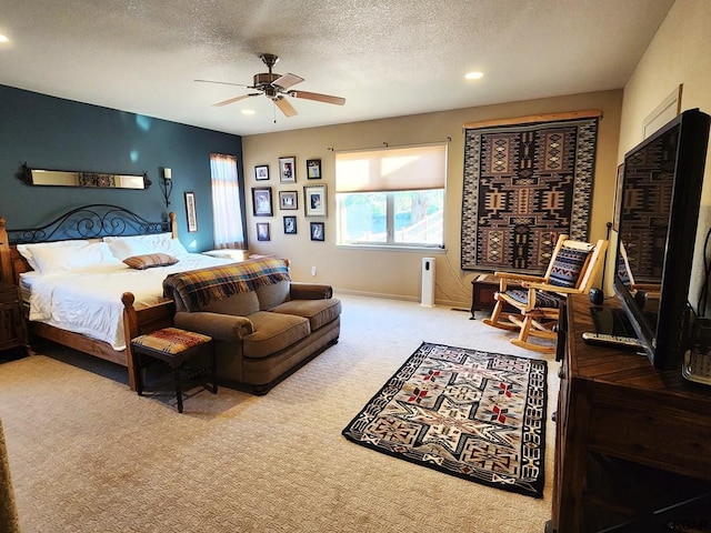 1381 3rd St, Penrose, CO 81240 - carpeted bedroom featuring a textured ceiling and ceiling fan
