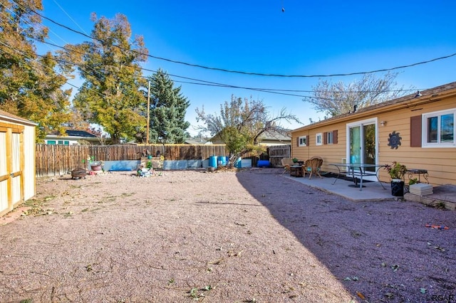 view of yard with a patio area