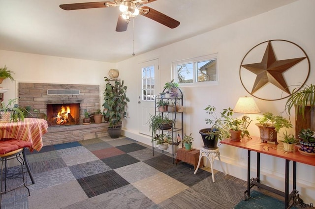 interior space with a stone fireplace