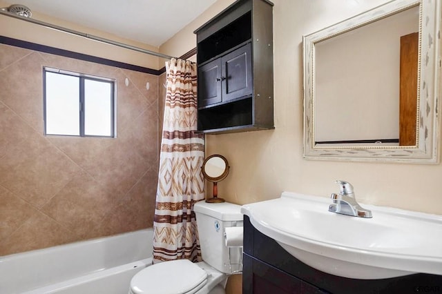 full bathroom featuring shower / tub combo, vanity, and toilet